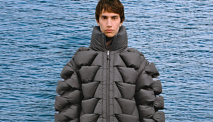 Axel Arigato 2025-2026 Fall Autumn Winter Mens Lookbook - Geometric Quilted Puffer Vest Outerwear Coat Sweater Jumper Knit Knitwear Wide Leg Baggy Loose Slouchy Denim Jeans Mesh Fishnet Net Varsity Jacket Holes Slashed Jogger Sweatpants Stripes Two-Tone Dipped