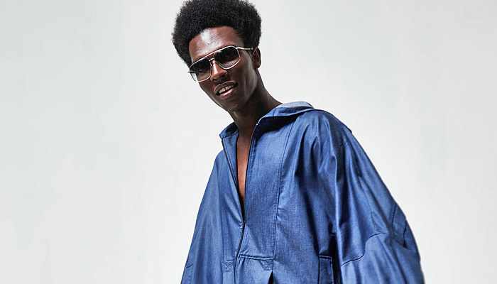 A.Potts 2025 Spring Summer Mens Lookbook Presentation - New York Fashion Week NYFW - URBANOCEANA - Iridescent Oversized Shirt Manskirt Sheer Shorts Culottes Onesie Jumpsuit Playsuit Coveralls Outerwear Coat Parka Robe Bedazzled Sequins Denim Jeans Patchwork Knit Cap Seashells Fringes Panels Mesh Eyelets Snakeskin Retro Tie-Dye Boots