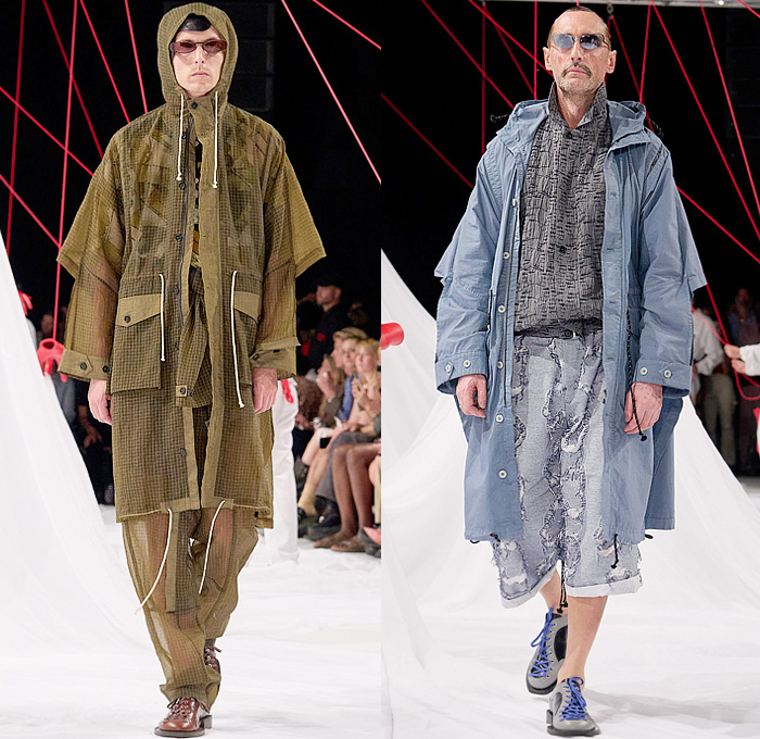 Henrik Vibskov 2025 Spring Summer Mens Runway Collection - Copenhagen Fashion Week Denmark CPHFW København - The Orchestra of the Soft Assistance SS25 - Check Grid Lattice Raincoat Outerwear Coat Parka Hood Pockets Frayed Raw Hem Wide Leg Baggy Loose Shorts Knit Sweater Jumper Stripes Patchwork Corals Seaweed Scarf Suit Blazer Grunge Industrial Building Bowling Shoes