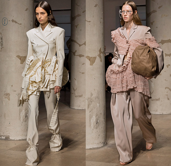 Rokh 2025 Spring Summer Womens Runway Collection - Paris Fashion Week Femme PFW - Rok Hwang - Thread Blossoms - Voluminous Rosettes Trompe L'oeil Flowers Floral Draped Ruffles Cinch Tank Top Hooks Tiered Accordion Pleats Wrapped Blazer Pantsuit Crop Top Midriff Patchwork Trench Coat Military Jacket Hanging Sleeve Loop Dress Blouse Fold Over Tied Slit Deconstructed Poufy Denim Jeans Studs Baggy Strings Embroidery Opera Gloves Sock Gaiters