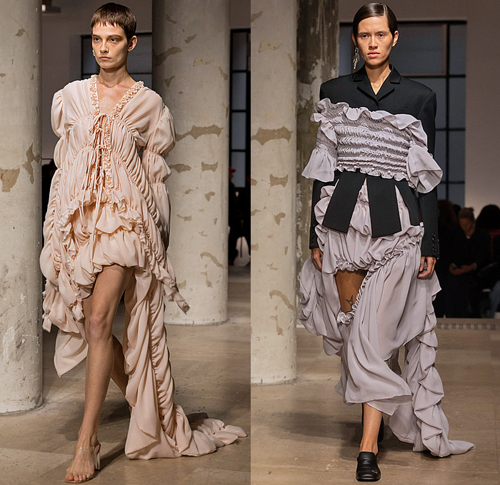 Rokh 2025 Spring Summer Womens Runway Collection - Paris Fashion Week Femme PFW - Rok Hwang - Thread Blossoms - Voluminous Rosettes Trompe L'oeil Flowers Floral Draped Ruffles Cinch Tank Top Hooks Tiered Accordion Pleats Wrapped Blazer Pantsuit Crop Top Midriff Patchwork Trench Coat Military Jacket Hanging Sleeve Loop Dress Blouse Fold Over Tied Slit Deconstructed Poufy Denim Jeans Studs Baggy Strings Embroidery Opera Gloves Sock Gaiters